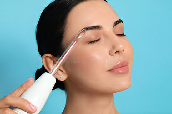 High frequency face wand used on skin to reduce acne and promote a clear, healthy glow